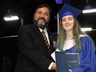 Comrade Rob Pitcher presents McKenna O'Brien with a $1000 bursary from the Bedford Legion during CP Allen Graduation